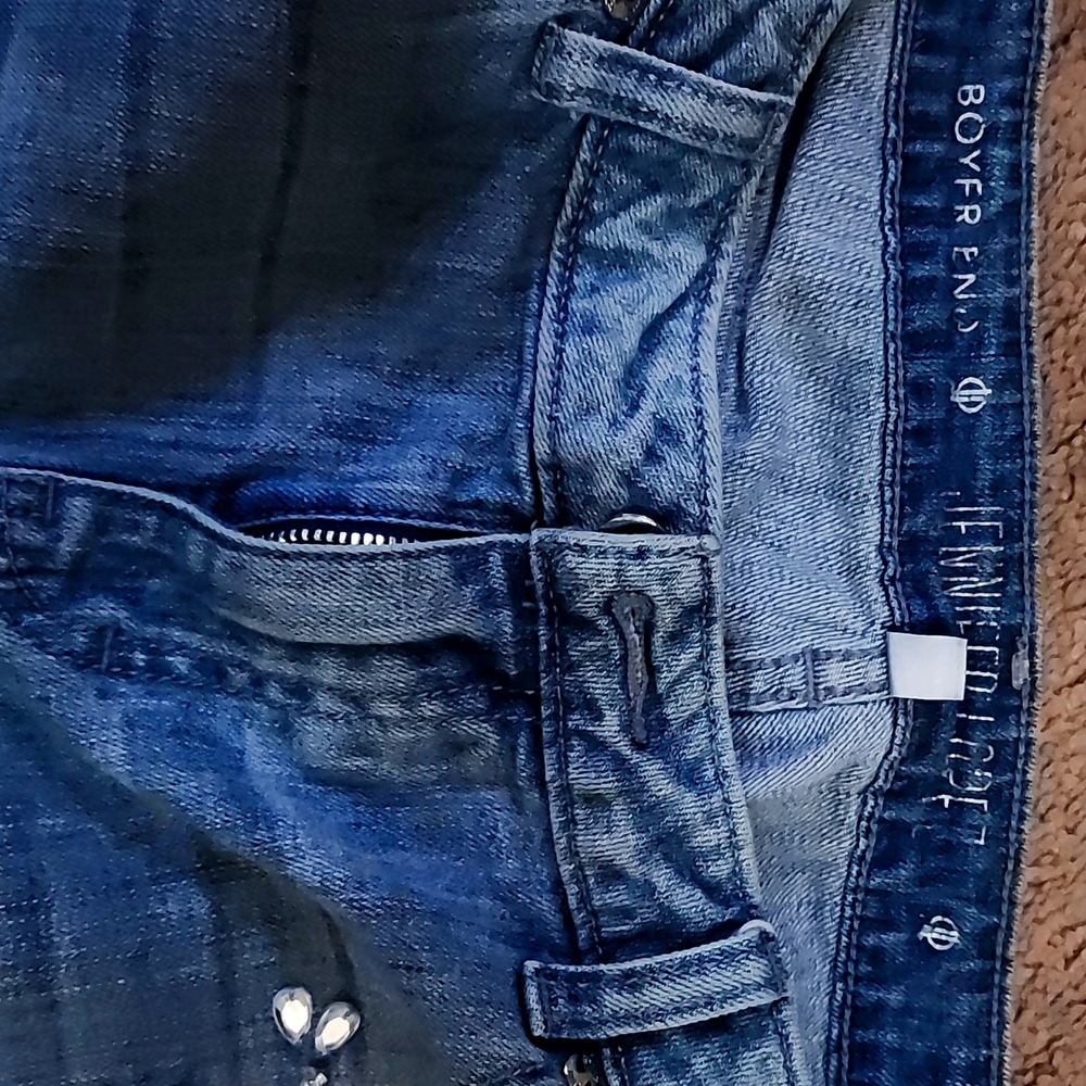 Jennifer Lopez jeans size 8. Distressed boyfriend style with gem Stone![]]!